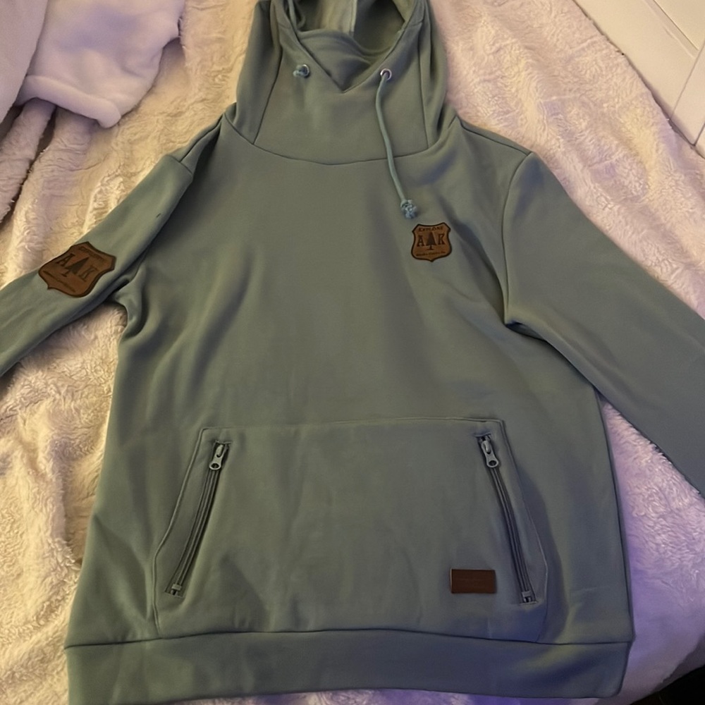 Teal hoodie.